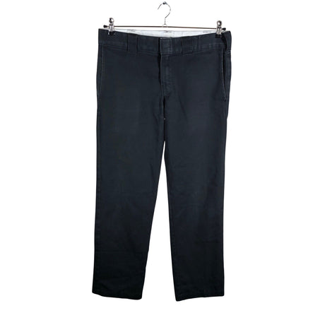 Unisex Dickies - Mittevenivad püksid, suurus M - Must ()