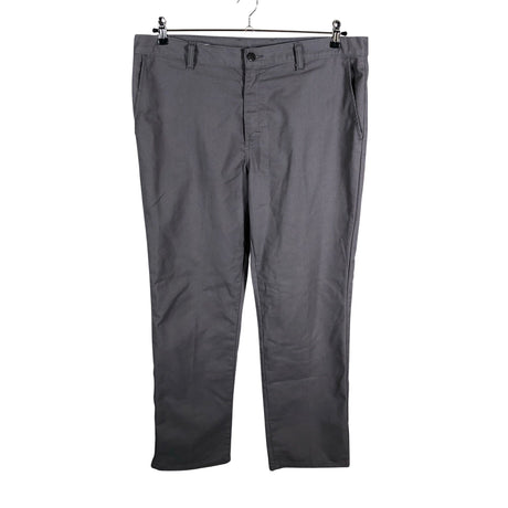 Unisex Dickies - Mittevenivad püksid, suurus W36 - Hall ()
