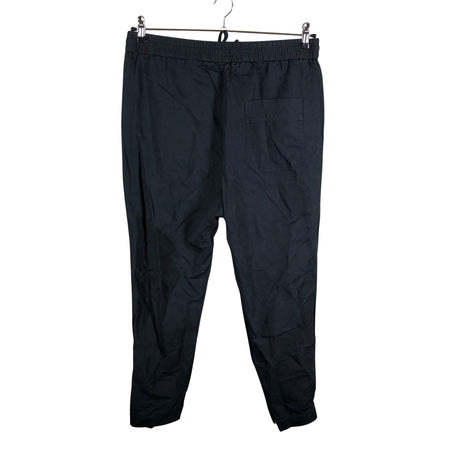 Unisex COS - Mittevenivad püksid, suurus 40 - Must (2)