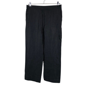 Unisex Arket - Mittevenivad püksid, suurus 42 - Must (1)