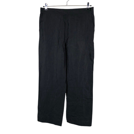 Unisex Arket - Mittevenivad püksid, suurus 42 - Must ()