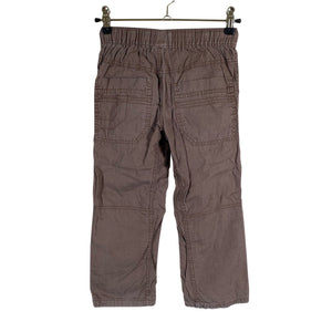 Unisex Next - Mittevenivad püksid, suurus 104 - 110 - Pruun (2)