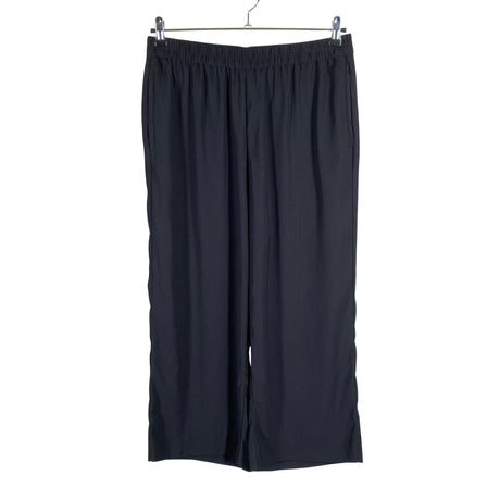 Unisex Lindex - Mittevenivad püksid, suurus 44 - Must ()