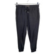 Unisex Noom - Mittevenivad püksid, suurus 34 - Must ()