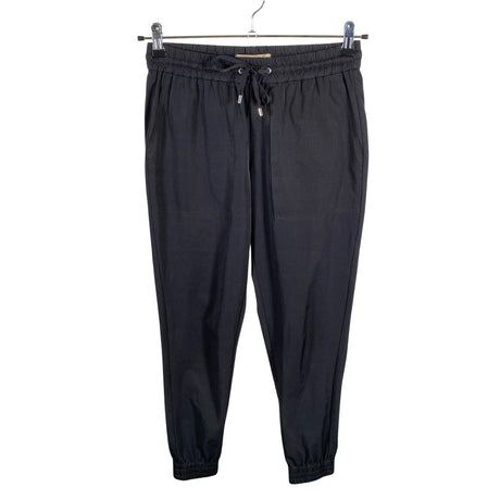 Unisex Noom - Mittevenivad püksid, suurus 34 - Must ()