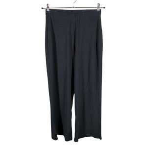 Unisex NOSH - Mittevenivad püksid, suurus 38 - Must (1)