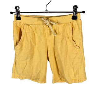 Unisex Lindex - Trikotaažist lühikesed püksid, suurus 122 - 128 - Kollane (1)