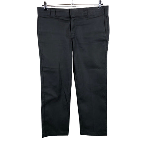 Unisex Dickies - Mittevenivad püksid, suurus W34 - Must ()