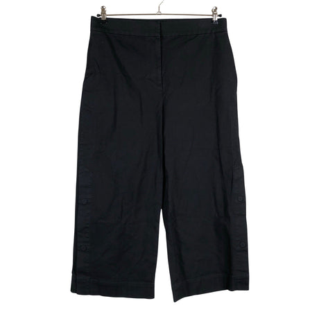 Unisex COS - Mittevenivad püksid, suurus 42 - Must ()