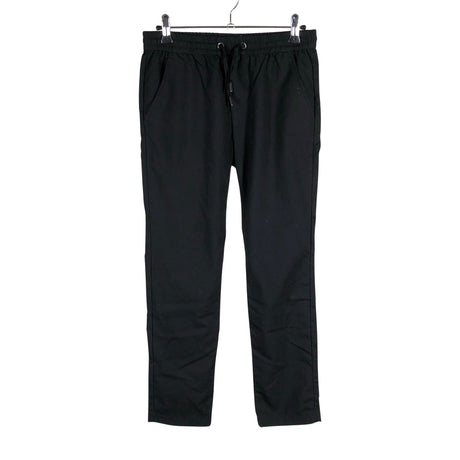Unisex Lindex - Mittevenivad püksid, suurus 146 - 152 - Must ()