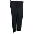 Unisex Voglia - Mittevenivad püksid, suurus 36 - Must ()
