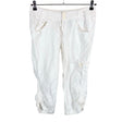 Unisex DKNY - Mittevenivad poolpikad püksid, suurus 38 - Valge ()