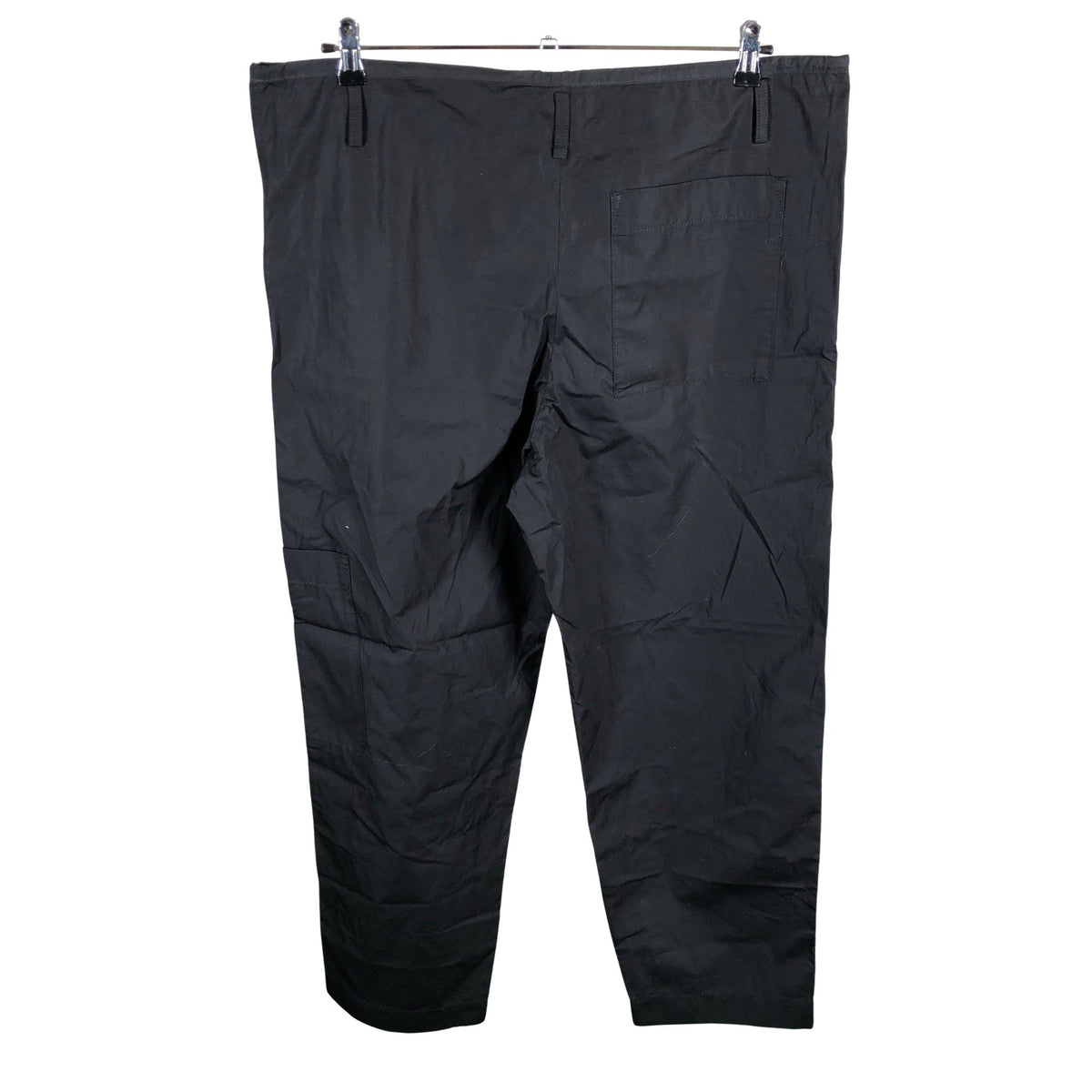 Unisex Arket - Mittevenivad püksid, suurus 44 - Must (2)