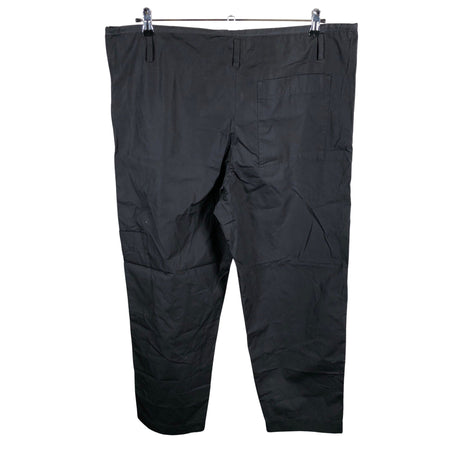 Unisex Arket - Mittevenivad püksid, suurus 44 - Must (2)