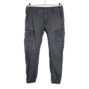 Unisex Jack & Jones - Mittevenivad püksid, suurus W33 - Hall (1)