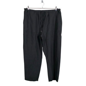 Unisex Marks&Spencer - Mittevenivad püksid, suurus 46 - Must (1)