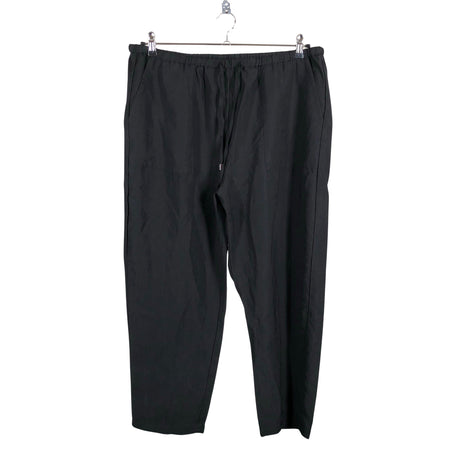 Unisex Marks&Spencer - Mittevenivad püksid, suurus 46 - Must ()