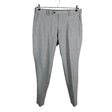 Unisex Uniqlo - Mittevenivad püksid, suurus W34 - Hall ()