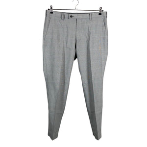 Unisex Uniqlo - Mittevenivad püksid, suurus W34 - Hall (1)