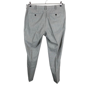Unisex Uniqlo - Mittevenivad püksid, suurus W34 - Hall (2)