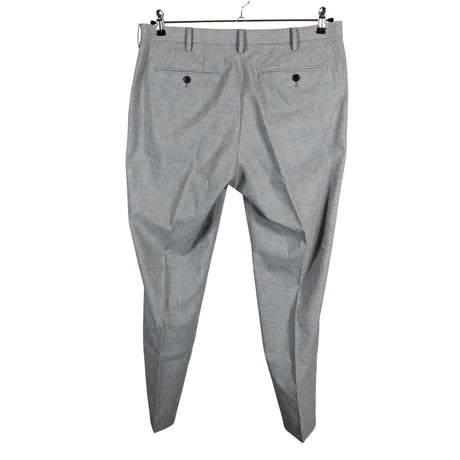 Unisex Uniqlo - Mittevenivad püksid, suurus W34 - Hall (2)
