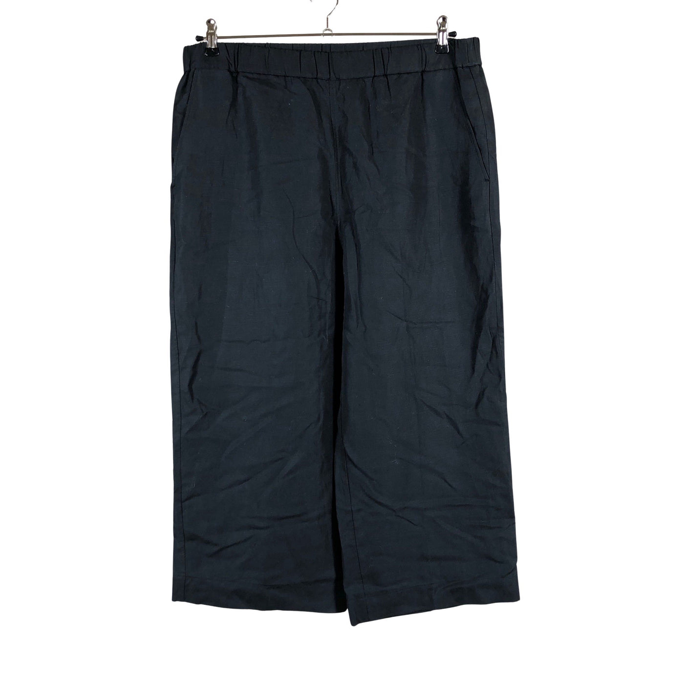 Unisex COS - Mittevenivad poolpikad püksid, suurus 44 - Must (1)