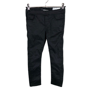 Unisex Polarn O. Pyret - Mittevenivad püksid, suurus 122 - 128 - Must (1)
