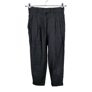Unisex COS - Mittevenivad püksid, suurus 34 - Must (1)