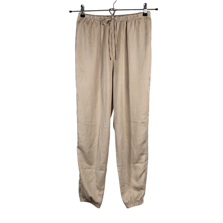 Unisex Uniqlo - Mittevenivad püksid, suurus 36 - Beige ()