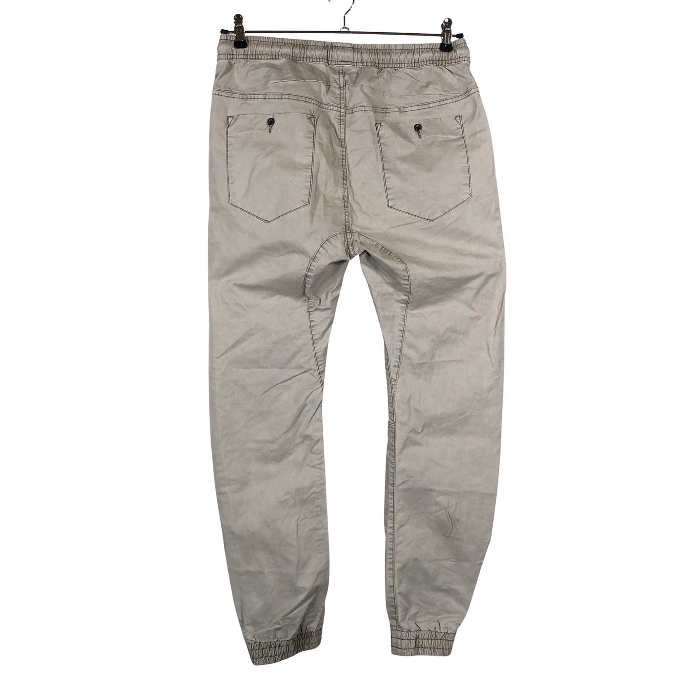 Unisex House Brand - Mittevenivad püksid, suurus 38 - Beige (2)