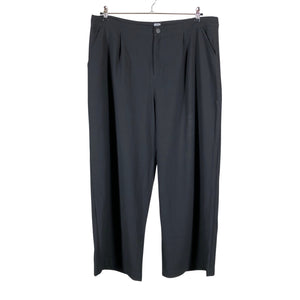 Unisex R-collection - Mittevenivad püksid, suurus 44 - Must (1)