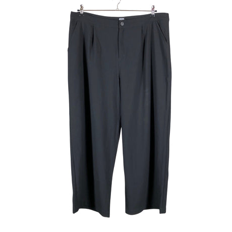 Unisex R-collection - Mittevenivad püksid, suurus 44 - Must ()