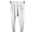 Unisex Iris Janvier - Trikotaažist püksid, suurus 36 - Beige ()