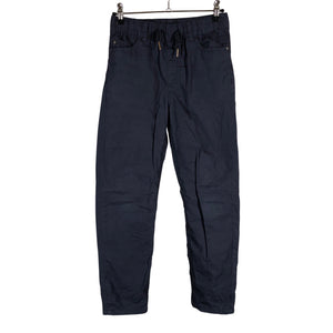 Unisex Molo Kids - Mittevenivad püksid, suurus 134 - 140 - Punane (1)