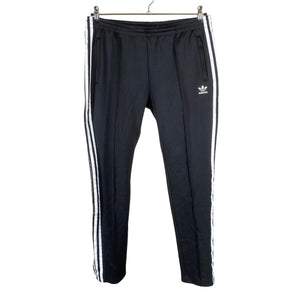 Unisex Adidas - Soojenduspüksid, suurus 42 - Must (1)