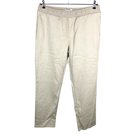Unisex Makia - Mittevenivad püksid, suurus W34 - Beige ()