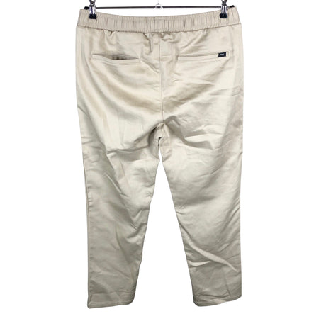Unisex Makia - Mittevenivad püksid, suurus W34 - Beige (2)