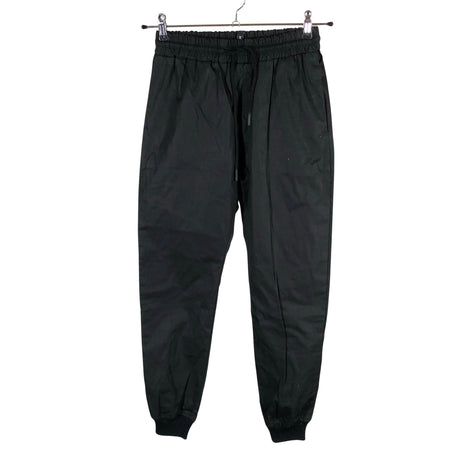 Unisex Nomen Nescio - Mittevenivad püksid, suurus 34 - Must ()