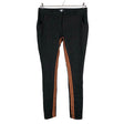 Unisex Nü - Mittevenivad püksid, suurus 40 - Must ()