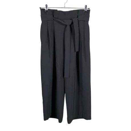 Unisex COS - Mittevenivad püksid, suurus 38 - Must ()