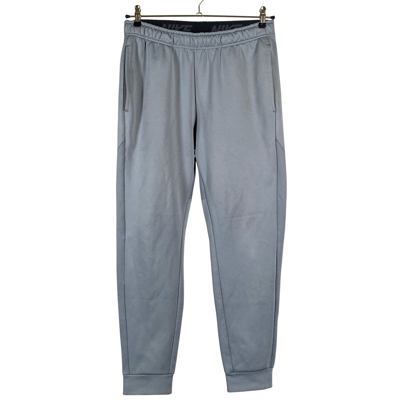 Unisex Nike - Soojenduspüksid, suurus M - Hall (1)