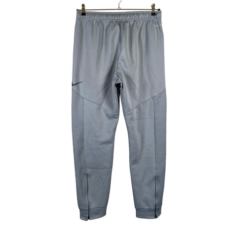 Unisex Nike - Soojenduspüksid, suurus M - Hall (2)