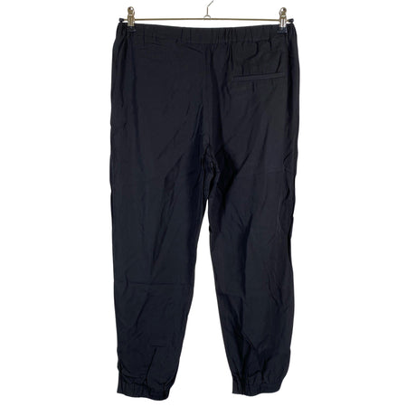 Unisex COS - Mittevenivad püksid, suurus 38 - Must (2)