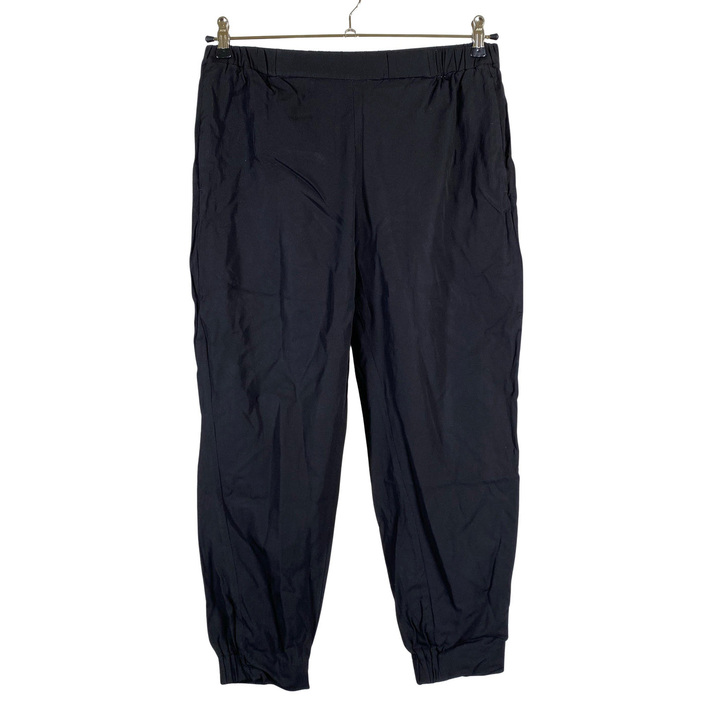 Unisex COS - Mittevenivad püksid, suurus 38 - Must (1)