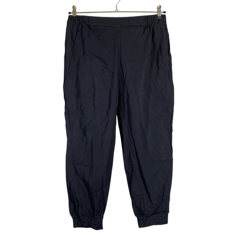Unisex COS - Mittevenivad püksid, suurus 38 - Must ()