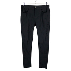 Unisex O.I.S - Mittevenivad püksid, suurus 46 - Must (1)