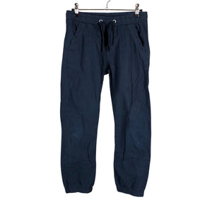 Unisex Lindex - Mittevenivad püksid, suurus 134 - 140 - Valge (1)