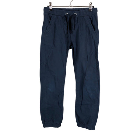 Unisex Lindex - Mittevenivad püksid, suurus 134 - 140 - Valge ()