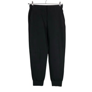 Unisex Lindex - Mittevenivad püksid, suurus 38 - Must (1)