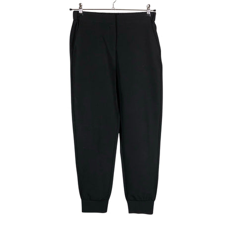 Unisex Lindex - Mittevenivad püksid, suurus 38 - Must ()